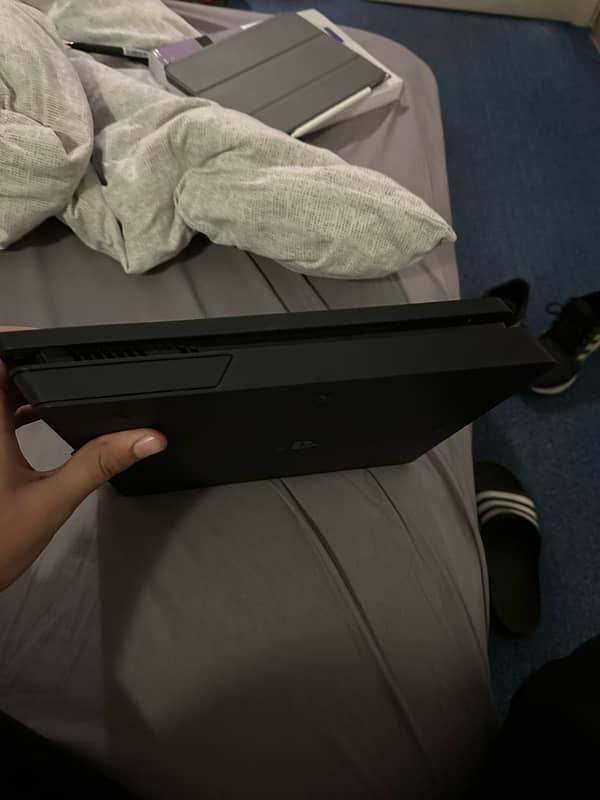 ps4 slim one tb for sale with 2 games and 2 controllers 3