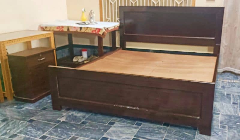 double bed almost new wooden bed with foam 1