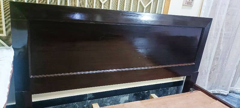 double bed almost new wooden bed with foam 4