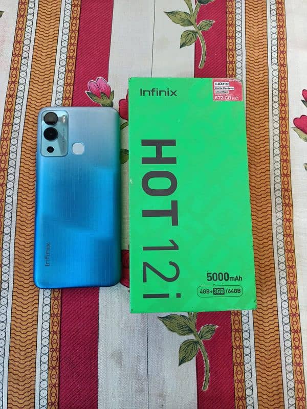 Infinix Hot 12i like new condition 4+4/64gb memory scratch less phone 1