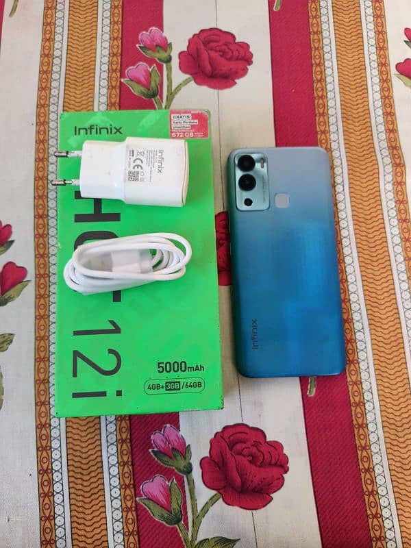 Infinix Hot 12i like new condition 4+4/64gb memory scratch less phone 2