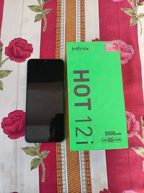 Infinix Hot 12i like new condition 4+4/64gb memory scratch less phone 7