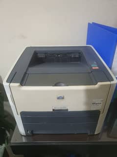 HP printer with ink and 1 packet of papers