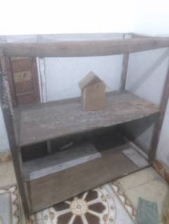 wooden cage for birds and hens. 0