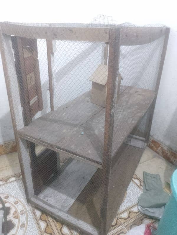 wooden cage for birds and hens. 1