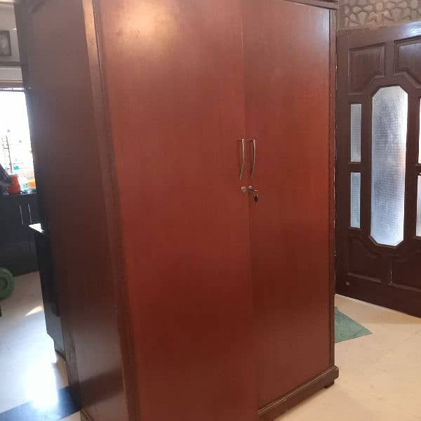 Two door wooden cupboard for sale 0