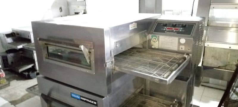 pizza oven imported, conveyor belt available, prep table, fryer 1