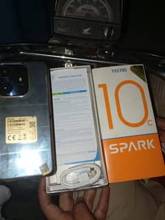 Tecno Spark 10c box and charger with 2 month warranty