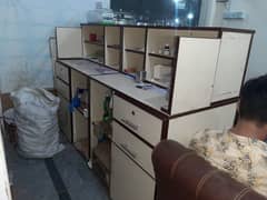 dispensary clinic table and small boxes shelves condition 100%.