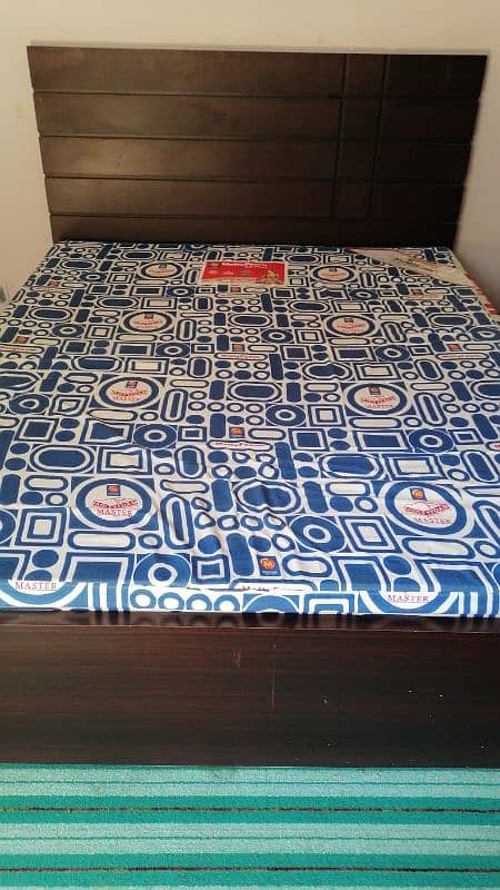 Queen size wooden bed in good condition 1