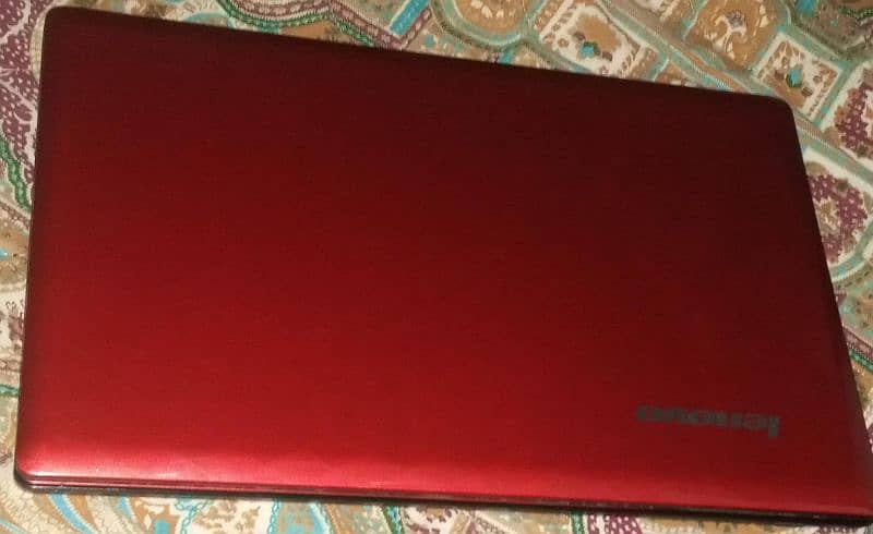 Red Colour lenovo laptop 2