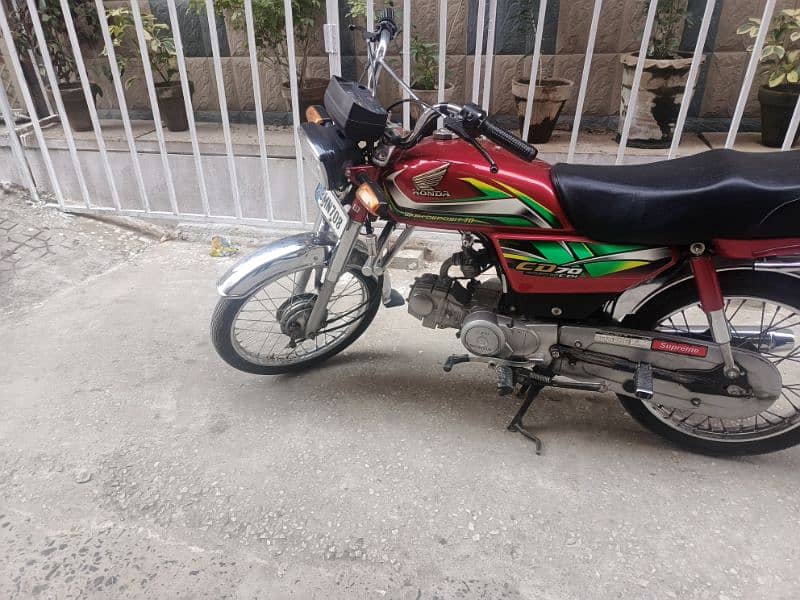 Honda 70 in lush conditions 0