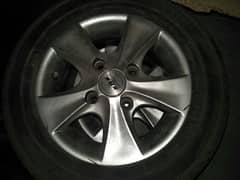 daihatsu cuore alloy rims ( almost brand new condition)