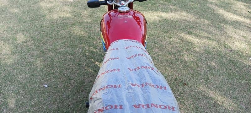 WhatsApp contact 0320.4576. 683 Honda 70 cc Red color engine ok hai 1