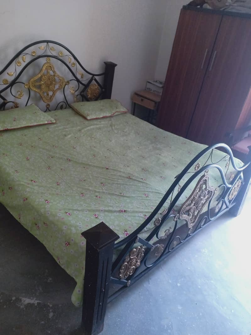 king size iron bed along spring mattress for sale 0