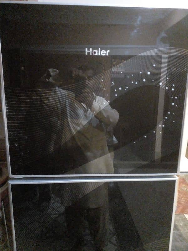 haier refrigerator black glass door new condction available 3