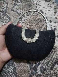 Small sized clutch black.