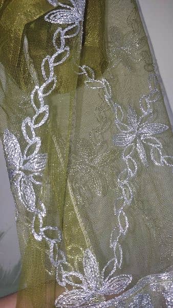 Three piece Maxi of net fabric un used. delivery available 3