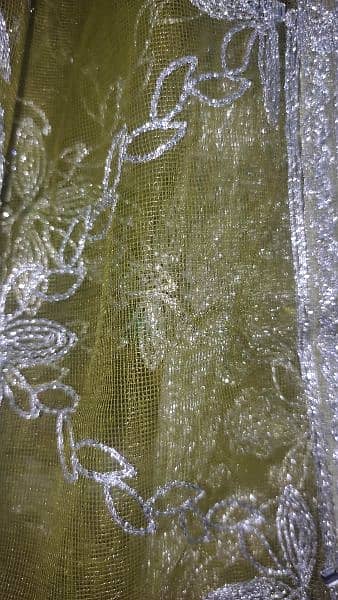 Three piece Maxi of net fabric un used. delivery available 11