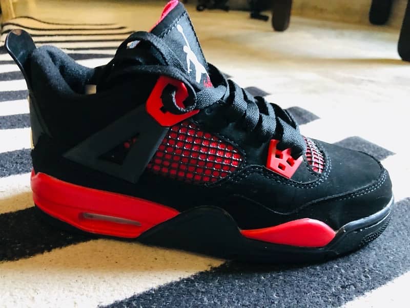 Jordan 4 Retro “Red Thunder” 2