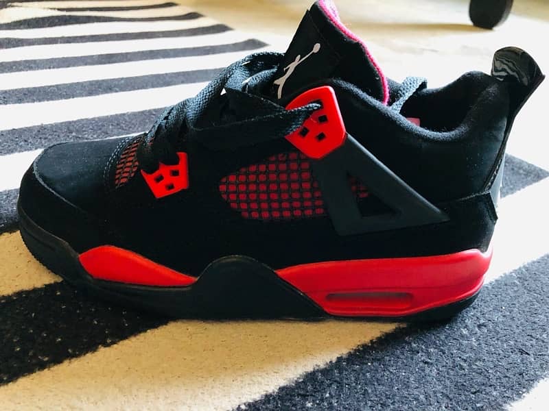 Jordan 4 Retro “Red Thunder” 6