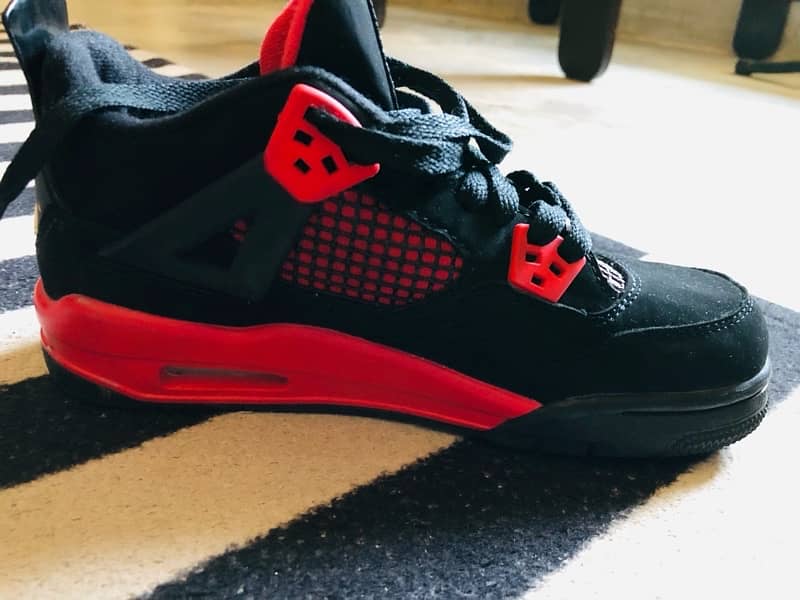 Jordan 4 Retro “Red Thunder” 7