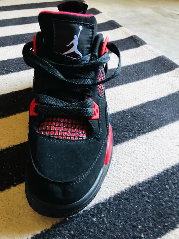 Jordan 4 Retro “Red Thunder” 8