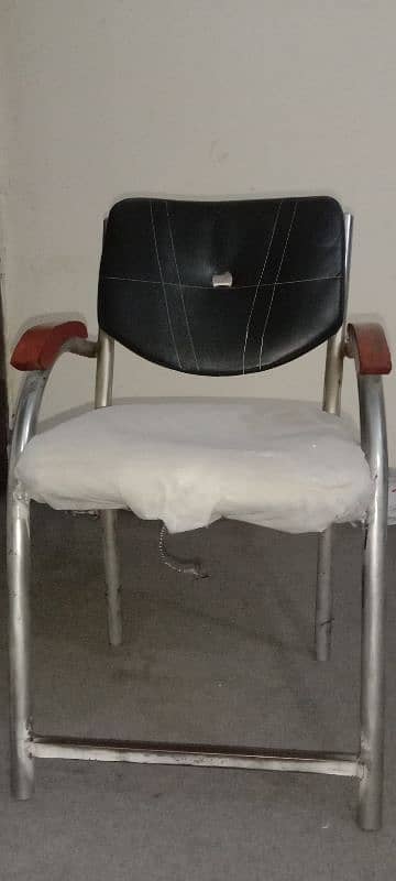 1 wooden table and 3 chairs of steel with good condition 0