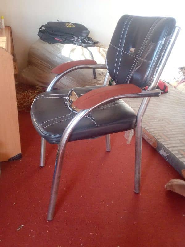 1 wooden table and 3 chairs of steel with good condition 2