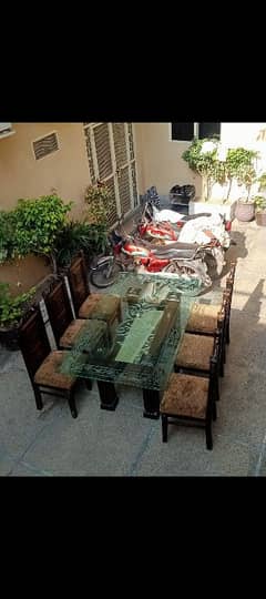 Solid Wood Dinning Table for sale along with 6 chairs