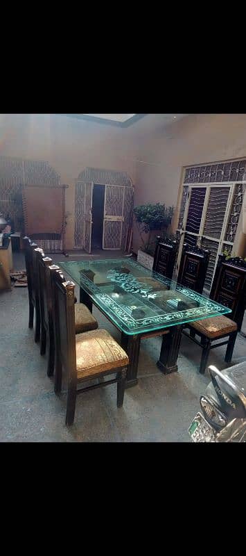 Solid Wood Dinning Table for sale along with 6 chairs 1