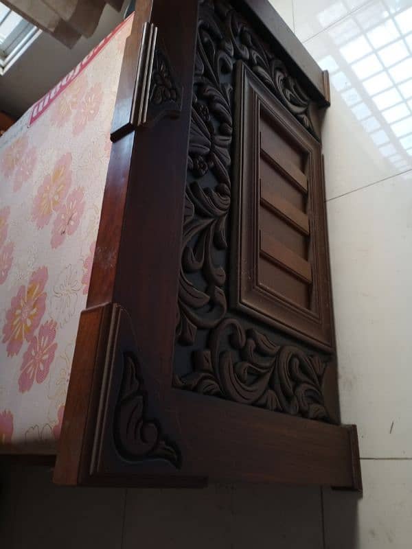 carved wood 2 single beds 1 center locker 1 dressing table 2