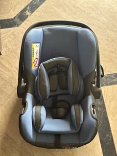 tinnies original carry cot/ car seat