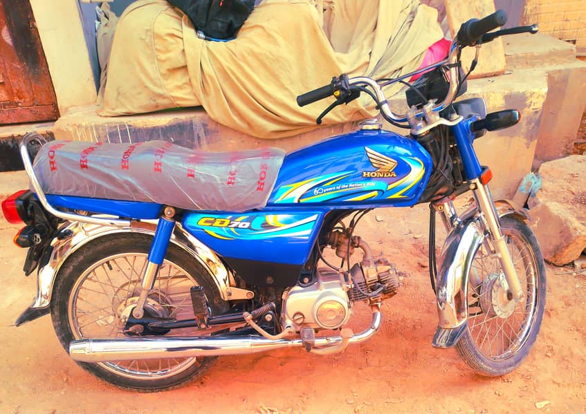 Honda CD 70 2024 5