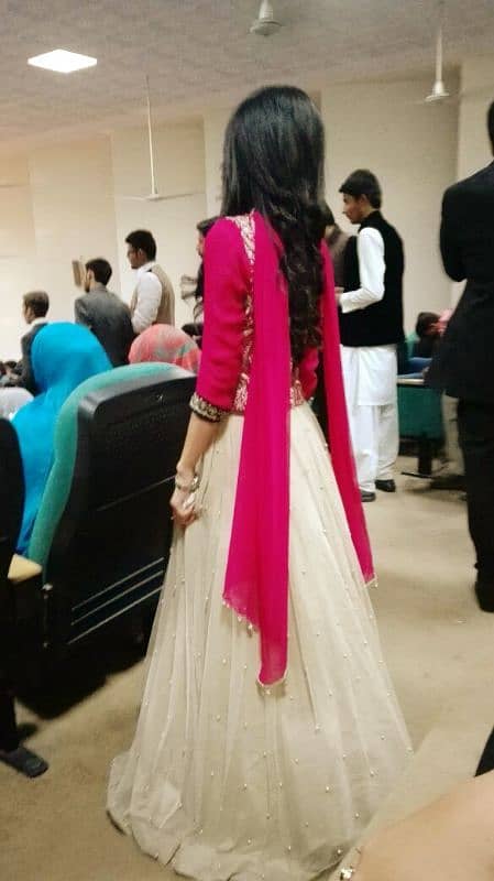 skin golden lehnga with pink blouse 1