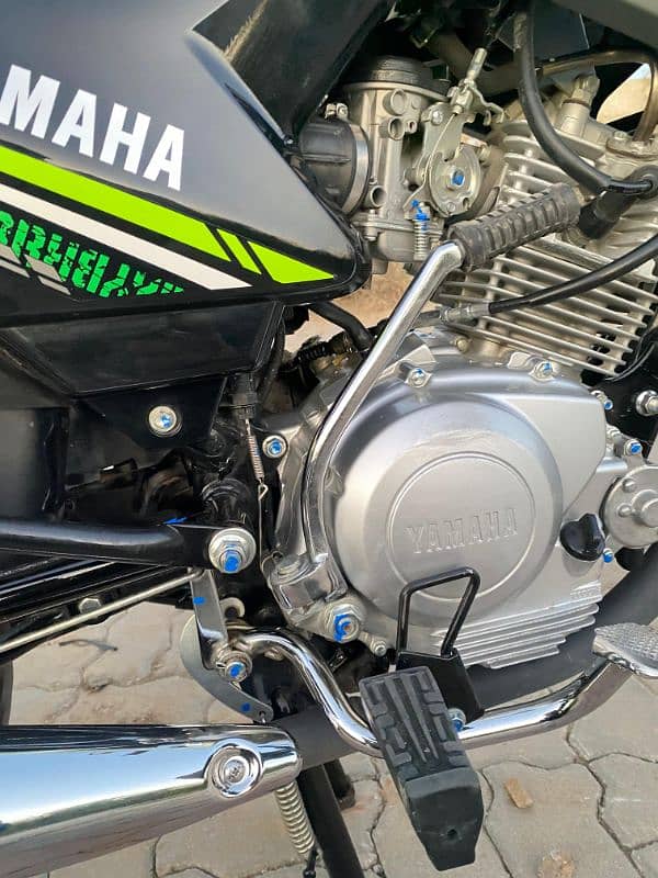 YBR 125 G new bike only 2100 chala hua hai  All punjab numbar 8