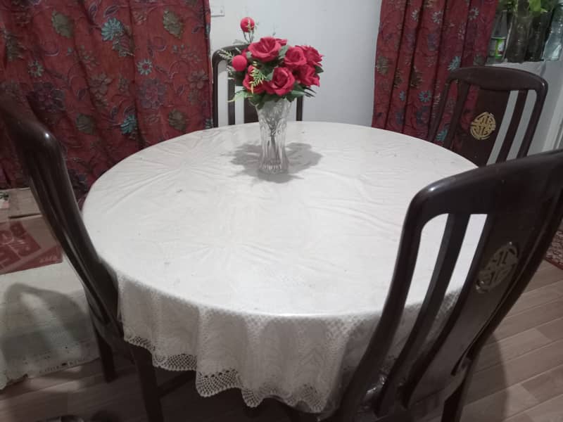 Wooden dining table with free chairs 0