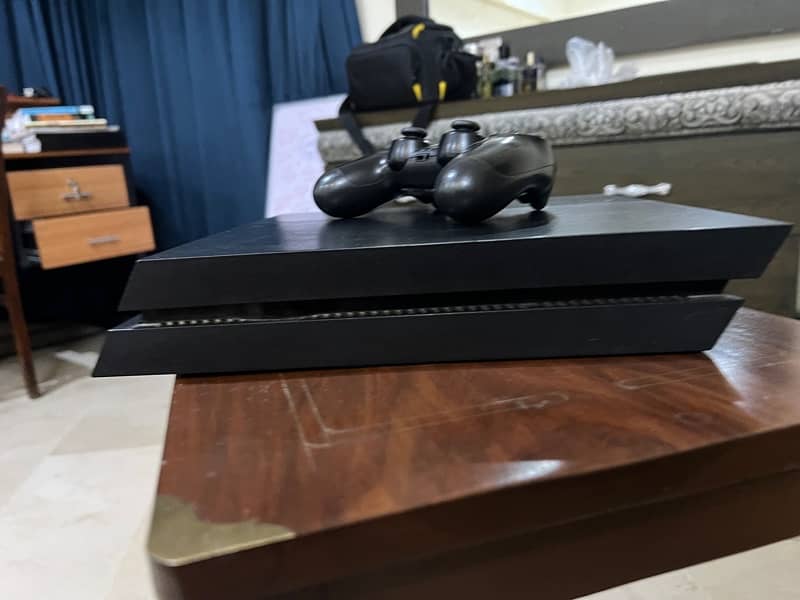 Well-Maintained PS4 for Sale - Great Condition, Ready to Play! 3