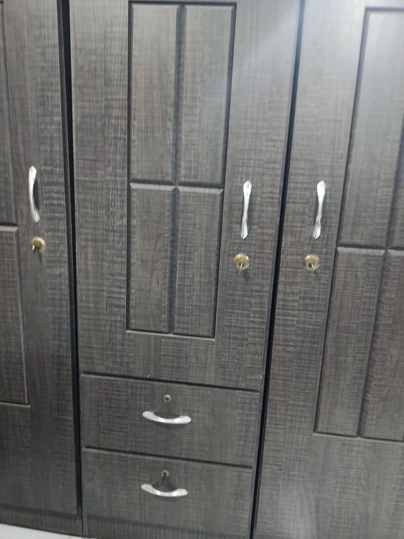 3 door cupboard 1