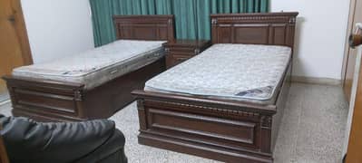 Two Single Beds with spring mattresses, center table, Dressing table c