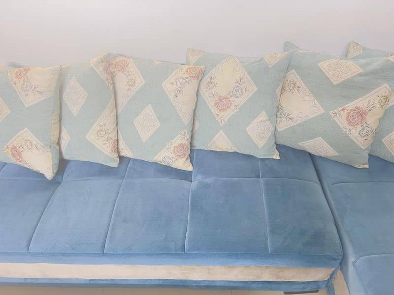 L shaped Sofa with sofa covers and cushions 1