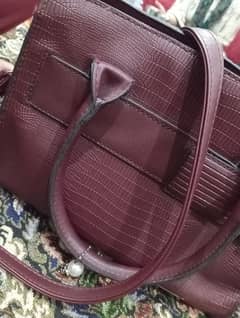 redish mehroon bag