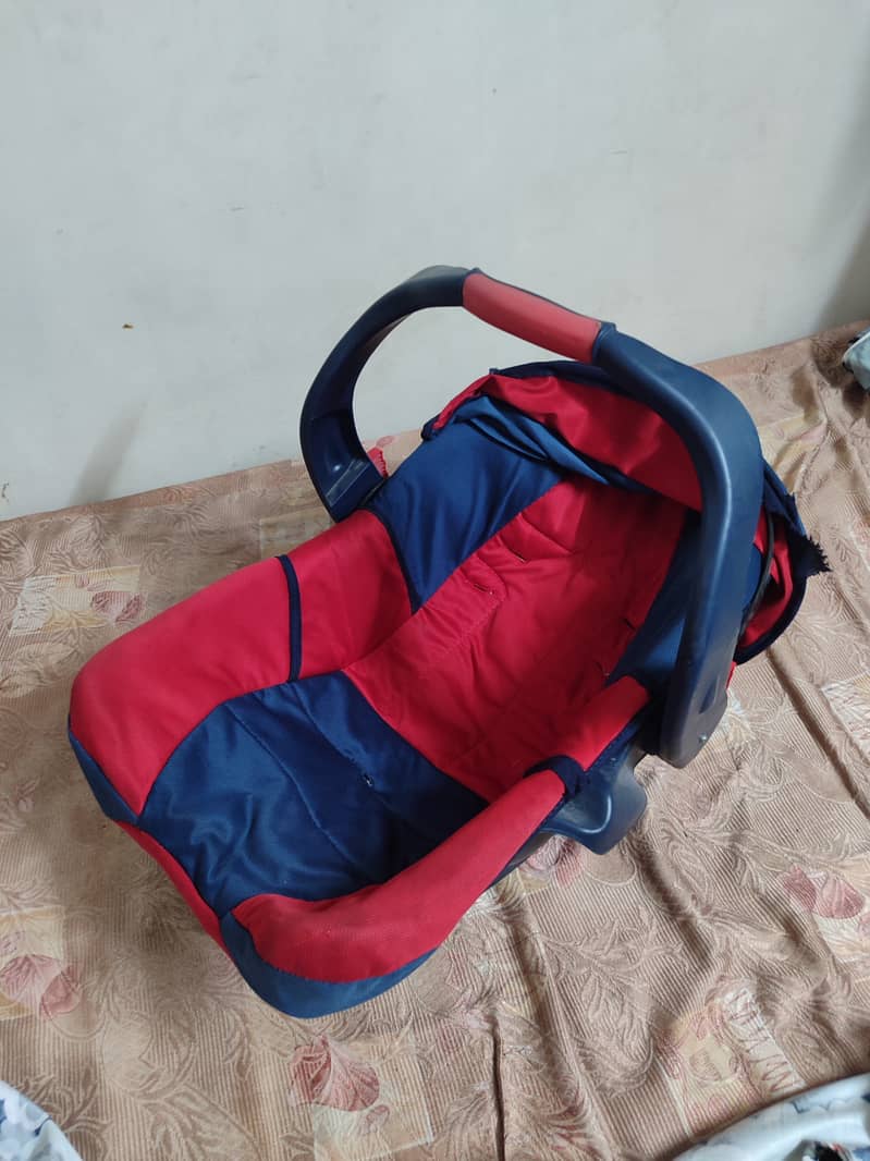 Carry Cot And High Chair 3