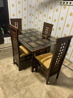 Dining table with seats and centre table