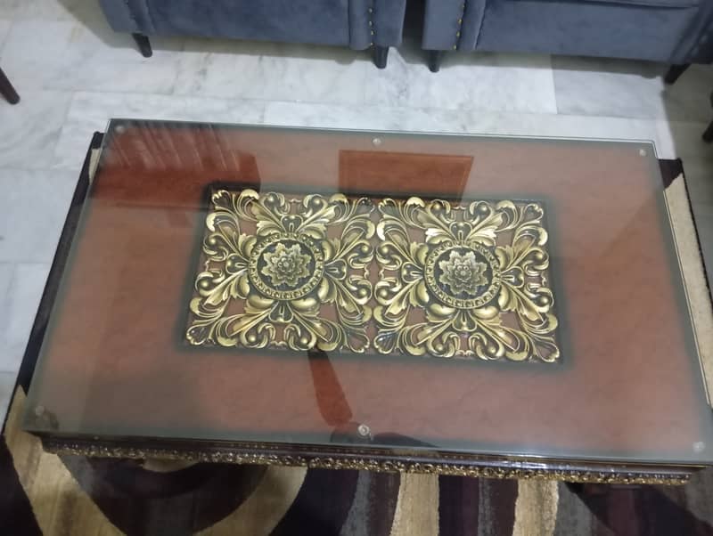 Elegant centre Table with Thick glass top and unique art work 0