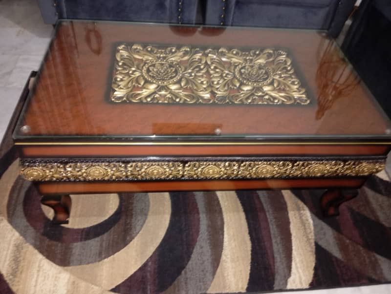 Elegant centre Table with Thick glass top and unique art work 1