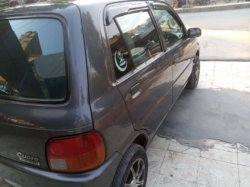 Daihatsu Cuore 2011 gari ki condition bhut achi hn 8