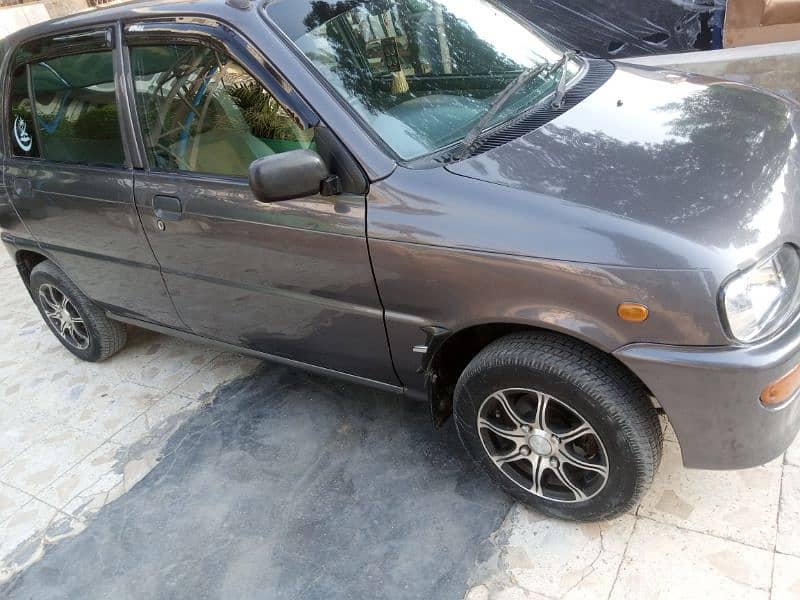 Daihatsu Cuore 2011 gari ki condition bhut achi hn 9