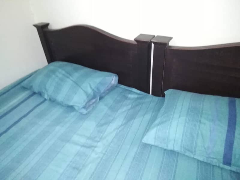 2 single beds new condition with spring mattress 1