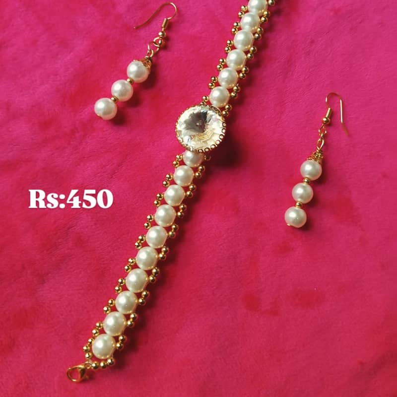 Pearl Bracelet with earrings Rs:450 only 0